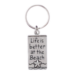pewter keychain with words life is better at the beach with a little star fish on it